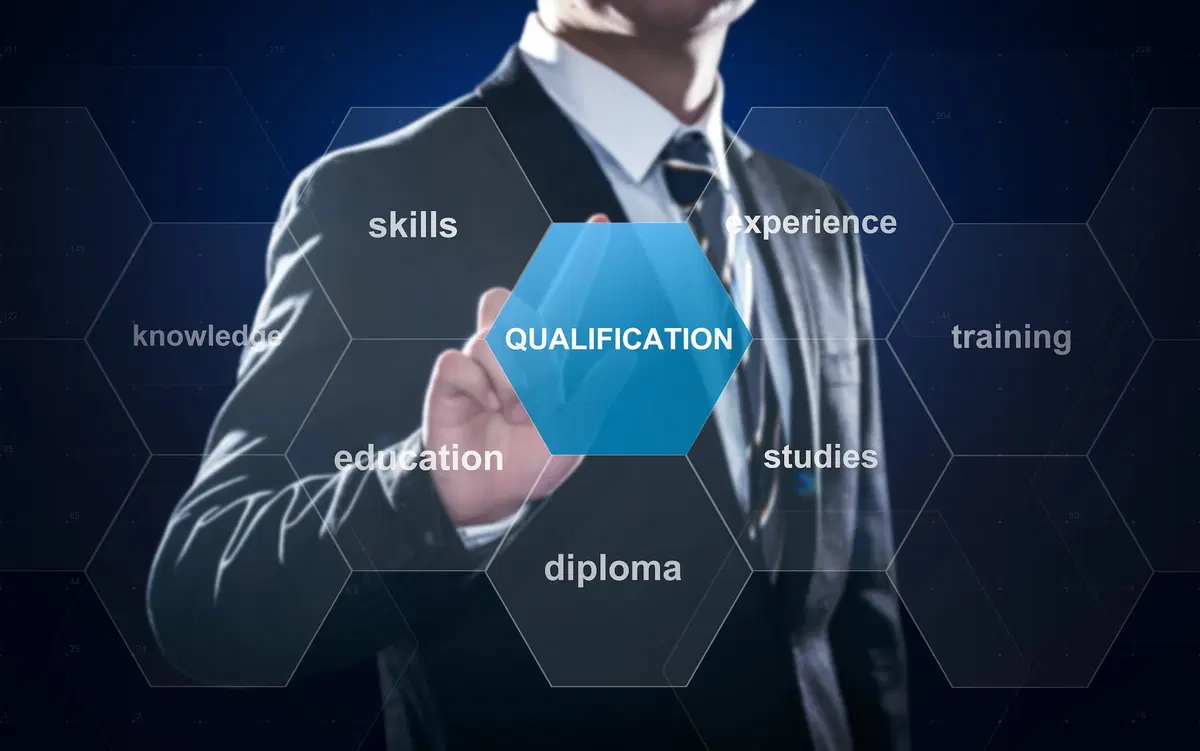 professional coach with certificates and credentials on wall, modern office setting